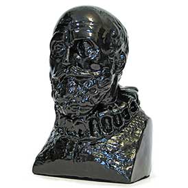 A small bust of John Dee with an iridescent black finish.
